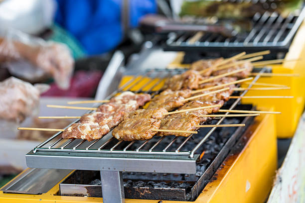 istock Grilled Thai sausages and seafood 497546714
