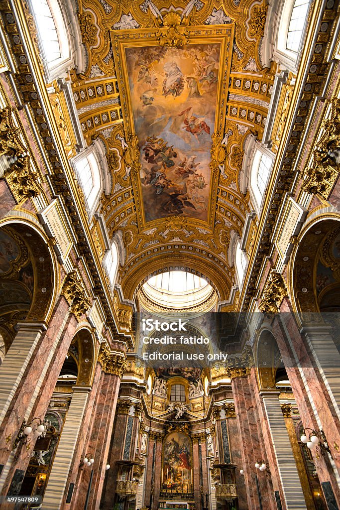 Inside of Basilica dei SS. Ambrogio e Carlo Rome, Italy - May 18, 2014: San Carlo al Corso is a basilica church in Rome, Italy, facing onto the central part of the Via del Corso. Altar Stock Photo