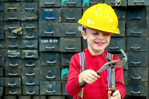 istock Little Manual Worker with Tong 497548680