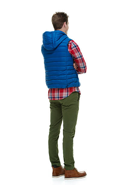 istock Rear view of woman standing & looking away 497549721