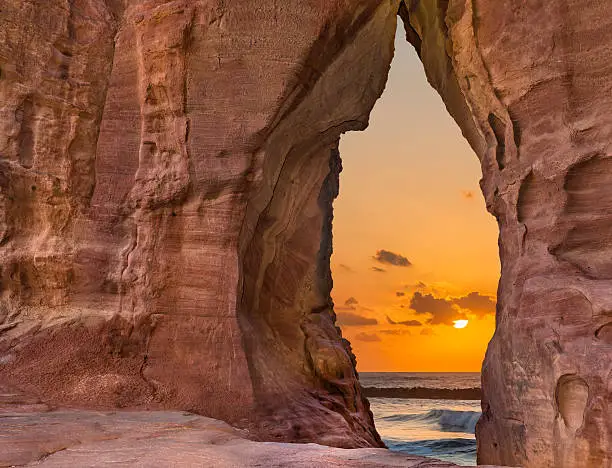 View through arch on the Red sea at sunset, Eilat, Israel