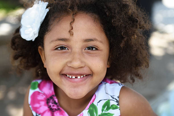 istock Biracial Girl Smiling for the Camera 497550653