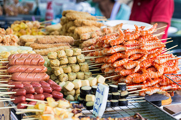 istock Grilled Thai sausages and seafood 497563180