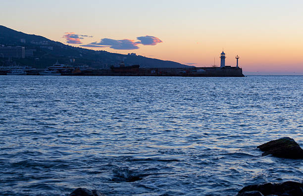 istock Beacon in Yalta at sunrise 497564400