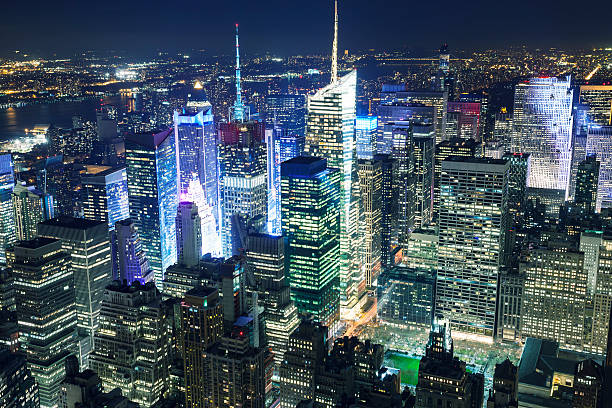 istock Skyscrapers Illuminated at Night, Manhattan, New York 497565099