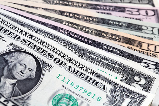 istock Angle view of US dollars in the form of semicircle 497565573