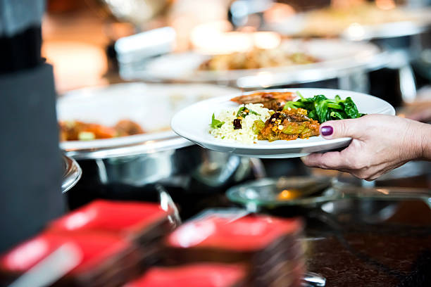istock Holding plate with food 497565874