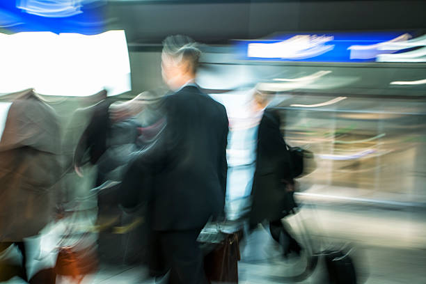 istock Business People Rushing at Airport 497566003