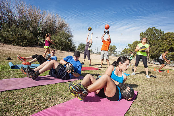 Outdoor Bootcamp Fitness Class stock photo