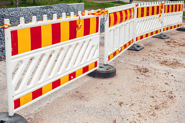 istock Striped red and yellow road barriers, area under construction 497568333