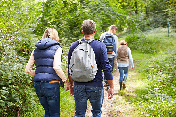 istock Family On Walk Through Beautiful Countryside 497569174
