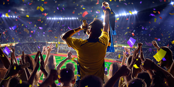 Fans on stadium game Fans on stadium soccer game Confetti and tinsel fan enthusiast stock pictures, royalty-free photos & images