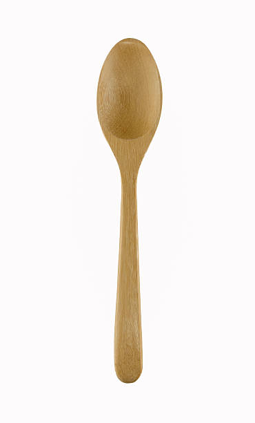 istock wooden spoon background isolated on white for you design 497570062