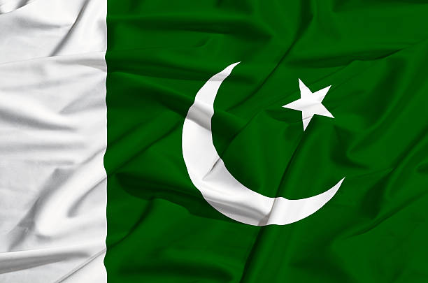 istock Pakistan flag on a silk drape waving 497570215