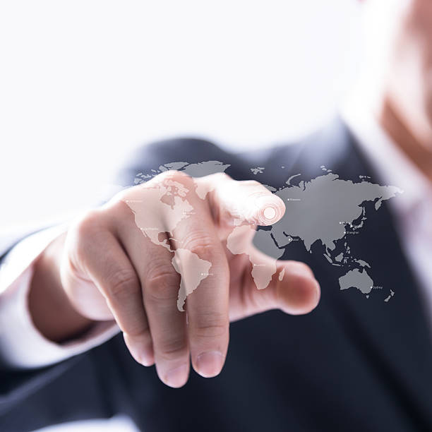 istock Businessman touching on world map 497571553