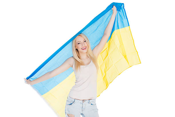 istock Woman with Ukrainian flag 497571703