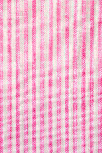 istock Pink and white striped fabric background 497572050