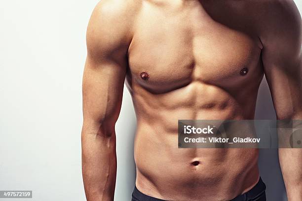 Muscular Torso Of Young Man Stock Photo - Download Image Now - Men, Muscular Build, Abdominal Muscle