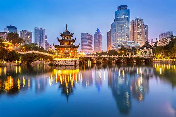 Cityscape of Guiyang at night Cityscape of Guiyang at night, Jiaxiu Pavilion on the Nanming River. Located in Guiyang City, Guizhou Province, China. china east asia stock pictures, royalty-free photos & images