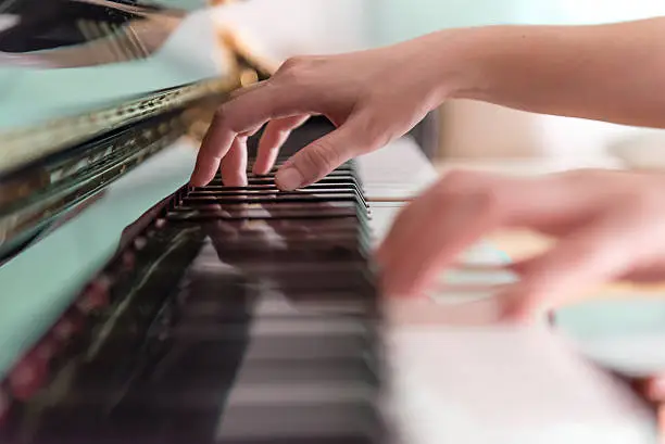 Photo of Playing Piano (Soft Focus)