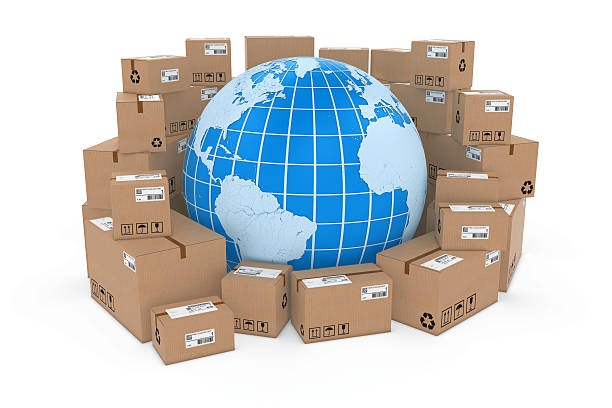 istock Worldwide Delivery Concept - Globe in Stack of Cardboard Boxes 497576578