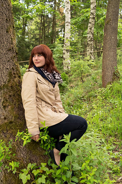 istock young woman in the forest 497577830