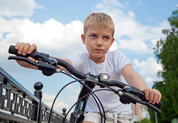 Boy biking  Summer joy