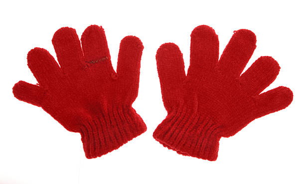 istock Pair of Darned Gloves Isolated on White Background 497585597