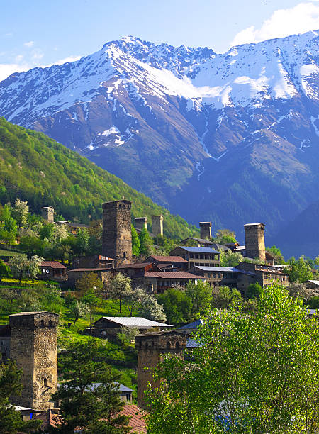 Mestia Traditional houses as defense towers, with magnificent Caucasus Mountains in background.  Mestia is located in the Samegrelo-Zemo Svaneti region, Georgia. north caucasus photos stock pictures, royalty-free photos & images