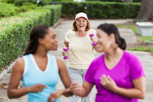 istock Women exercising in park 497587971