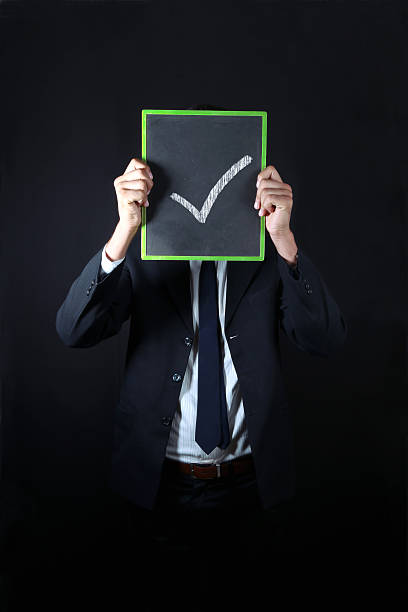 Businessman with check mark sign