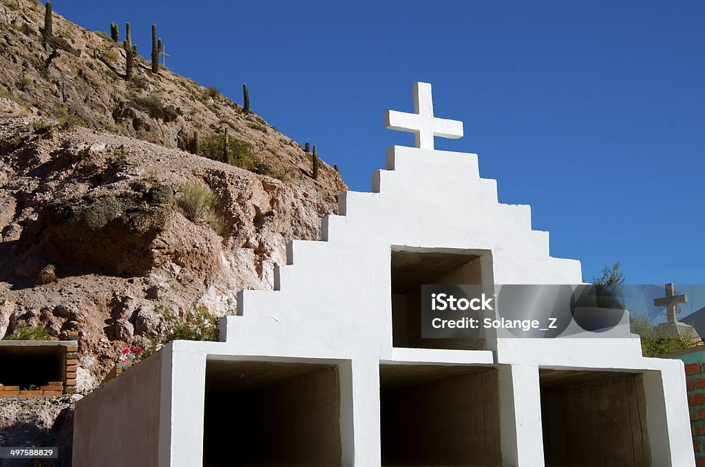 Purmamarca Cemetery Purmamarca in Jujuy province, in Argentina,  has one of the most unusual cemeteries. It's on the foothills of a beautiful and colorful hill. Argentina Stock Photo