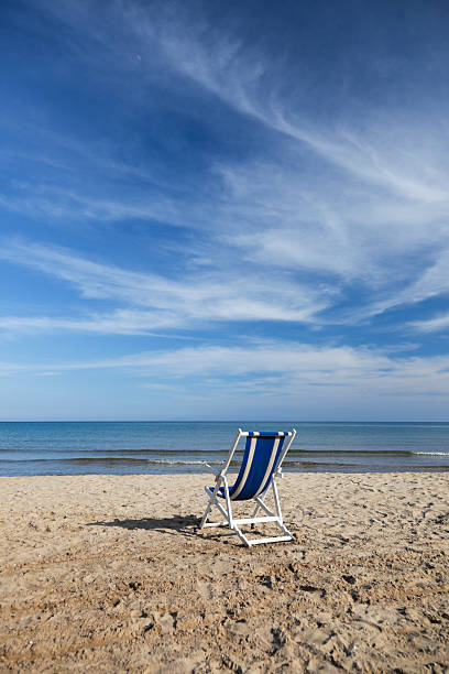 istock Blue and white chair on beautiful sandy beach. 497595973