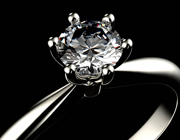 istock Golden Engagement  Ring with Diamond. Jewelry background 497597863