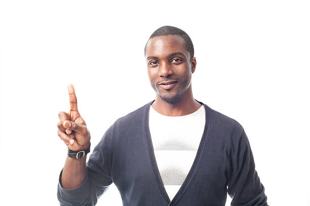 istock Smiling casual dressed black man gesturing with finger. 497599143
