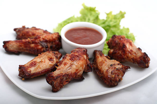 istock Chicken Wings with Red Sauce 497599395