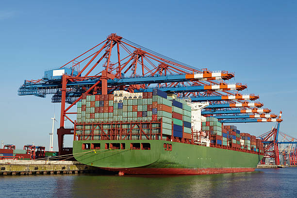 istock Container vessel at terminal in port 497599495