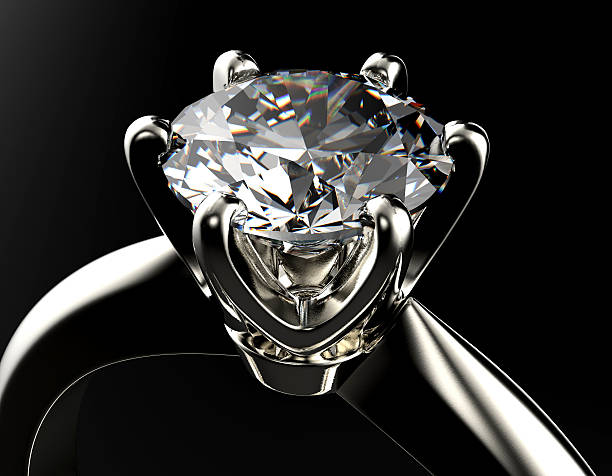 istock Golden Engagement  Ring with Diamond. Jewelry background 497599711