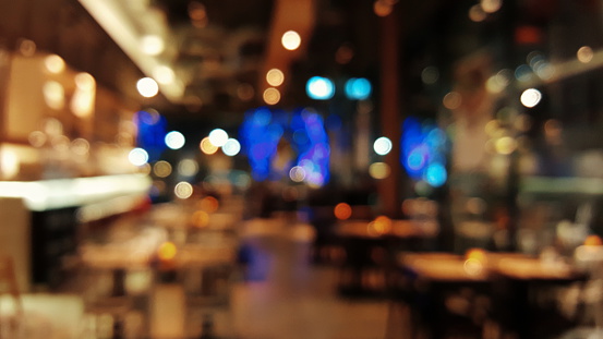 Night colors bokeh blur background at a restaurant