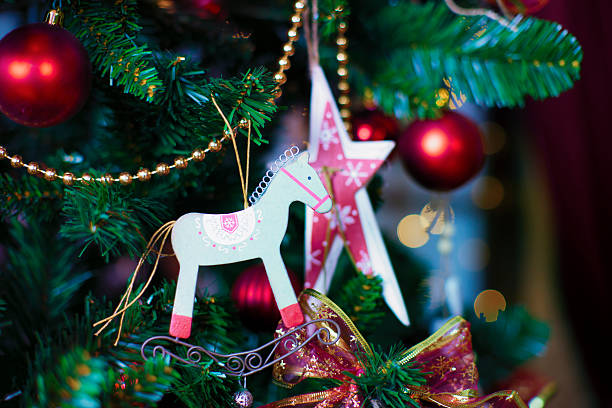 istock Shiny Christmas balls hanging on pine branches 497601752