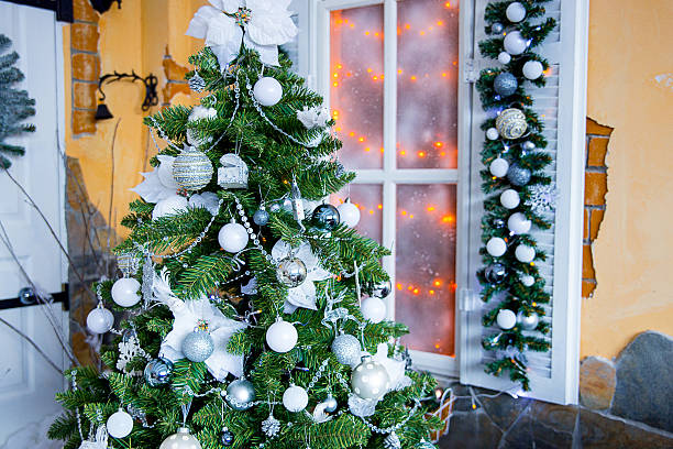 istock Christmas fir-tree in white flowers 497604282