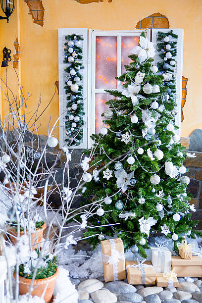 istock Christmas fir-tree in white flowers 497604640