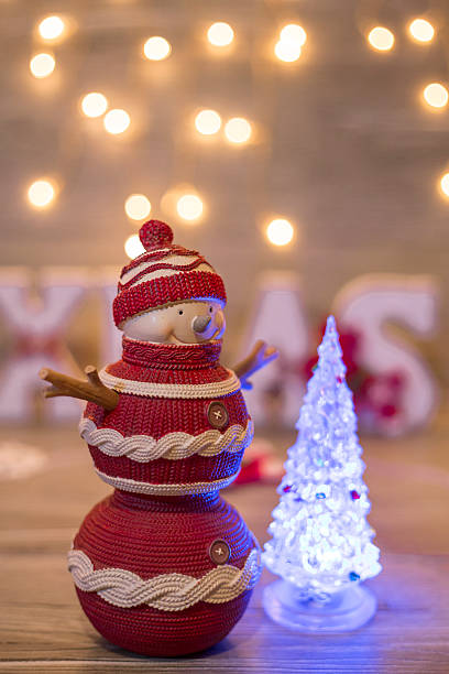 istock Snowman with Christmas decoration 497610148