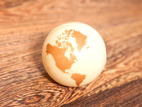 Earth Globe on wooden background