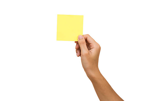 istock woman hand carrying an empty notepaper isolated on white background 497612788