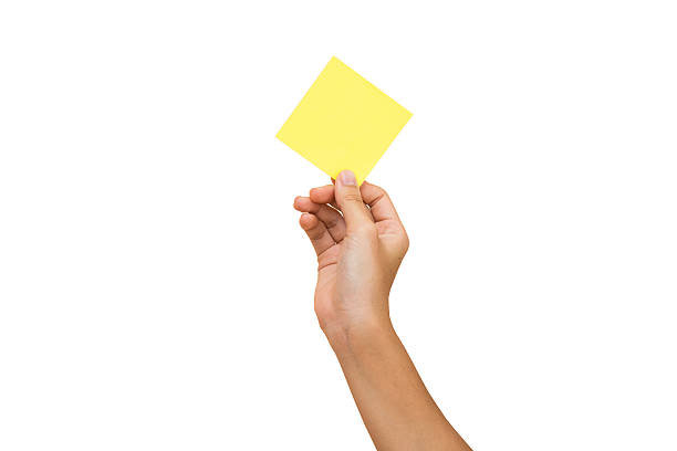 istock woman hand carrying an empty notepaper isolated on white background 497612914