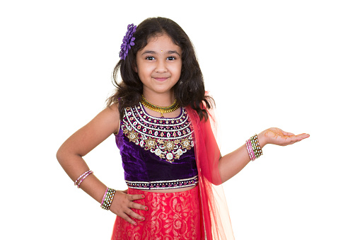 Portrait of a Little Girl in Indian Dance Pose, Isolated, White