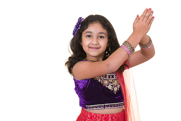 Portrait of a Little Girl in Indian Dance Pose stock photo