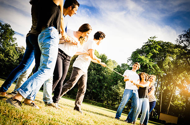 istock Tug of war game outside 497618579