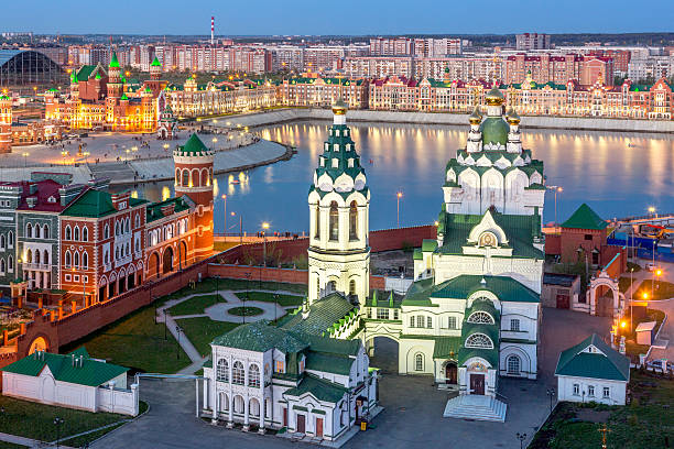 Orthodox church on background of Yoshkar-Ola city at spring night, Russia